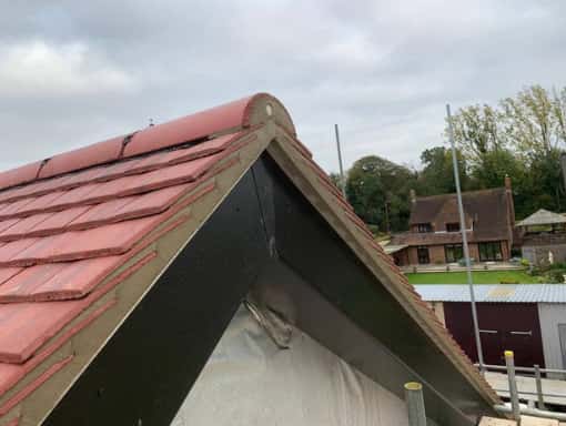 This is a photo of a new gable roof installation. This work was carried out by Stamford Roofing